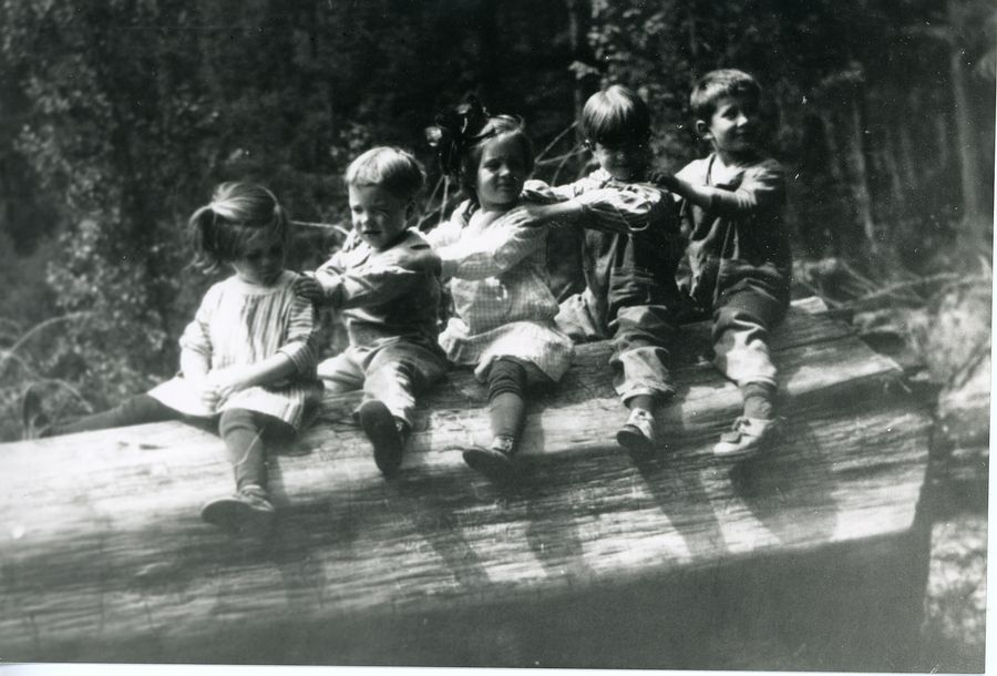 McAlister and Huddle cousins (?) on a log