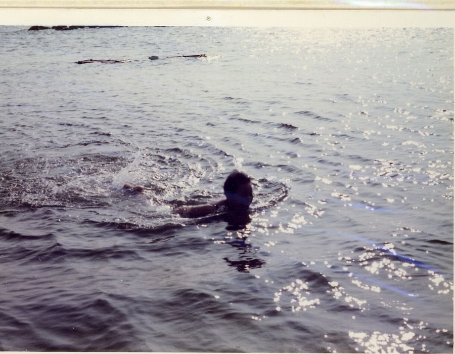 Seiko's Mother swimming in the ocean.\nJuly 1973, 71 Years Old